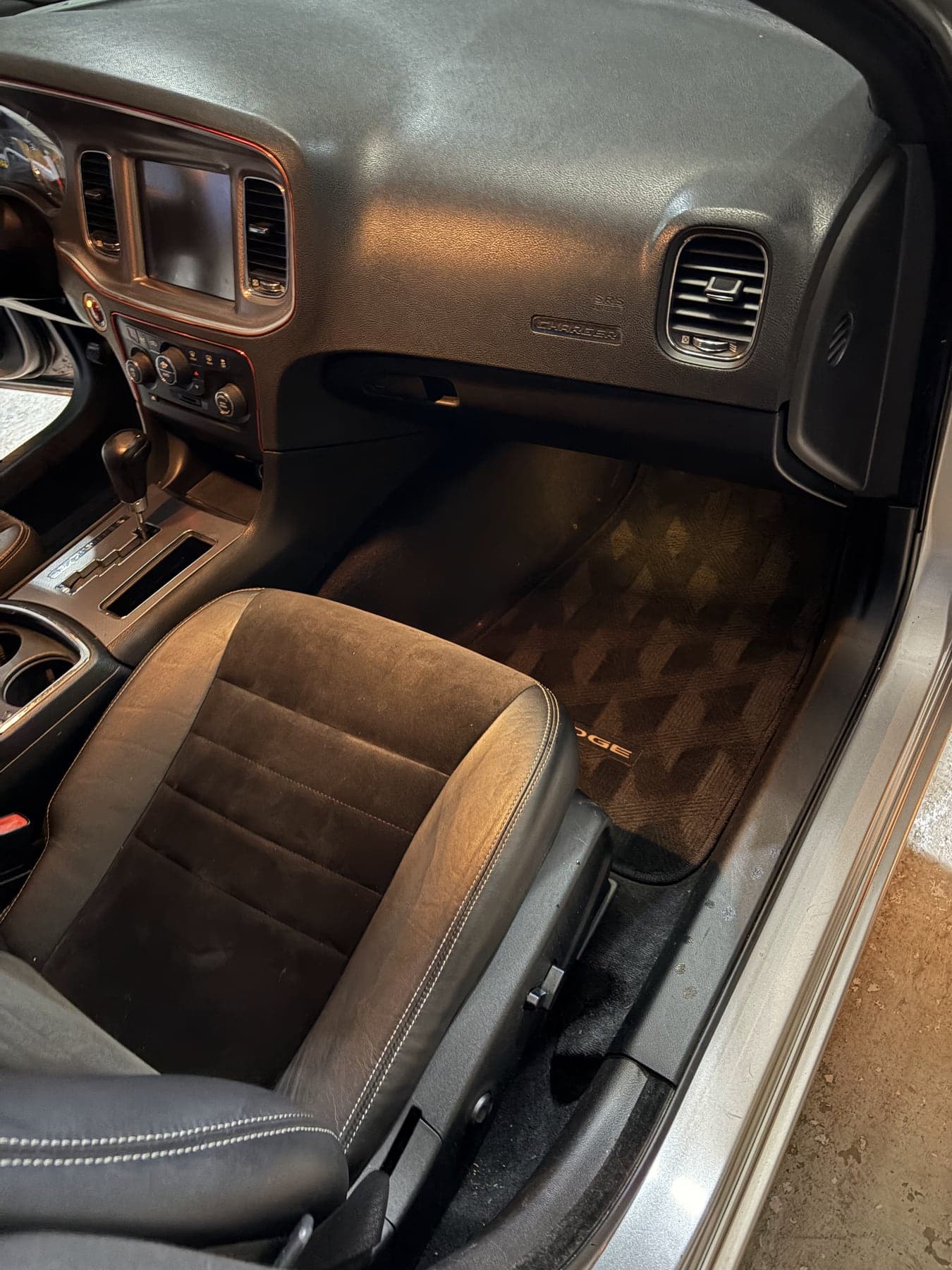 Dodge Charger passenger footwell cleaned and floor mat restored