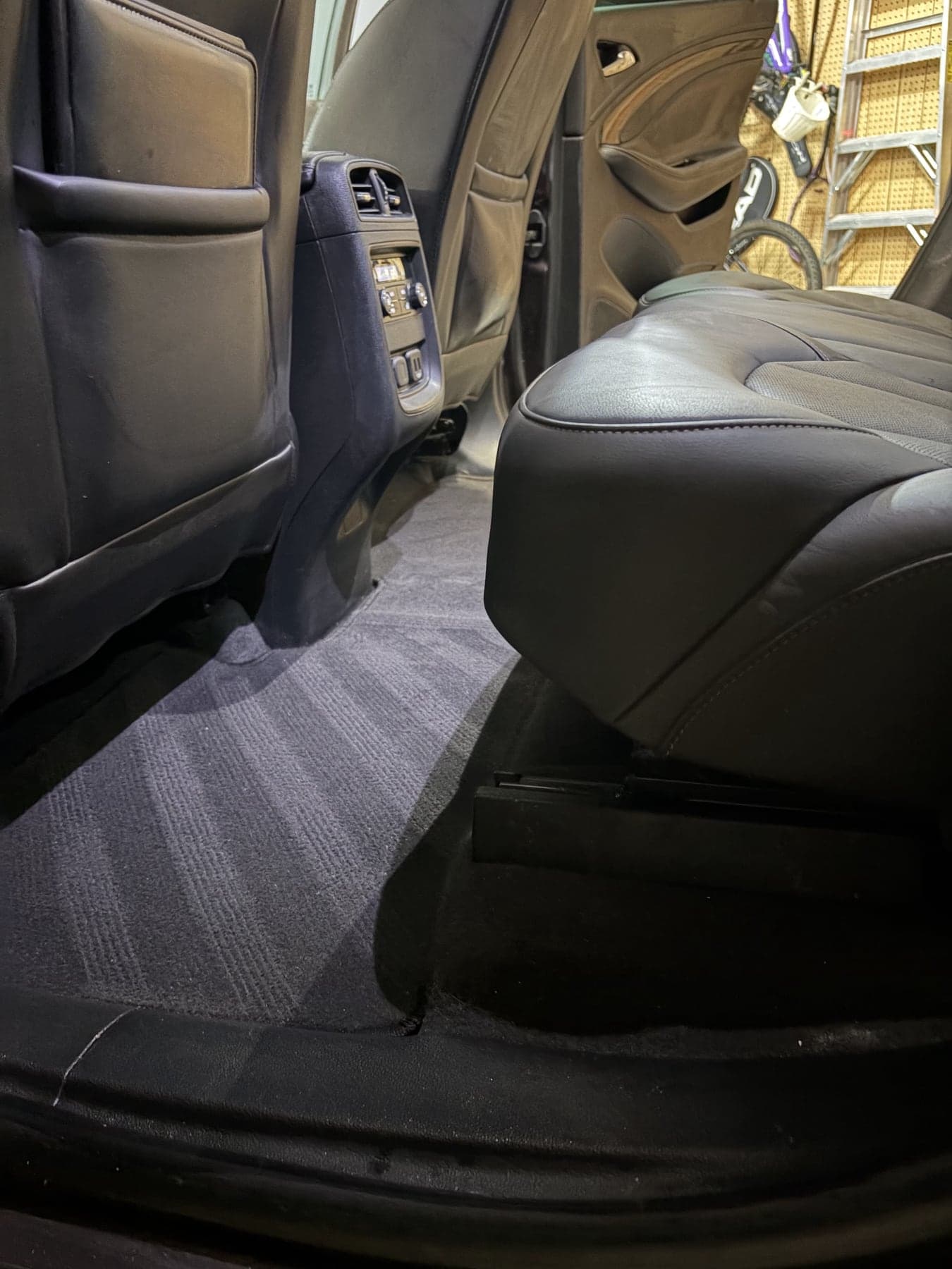 Rear seat floor carpet freshly vacuumed